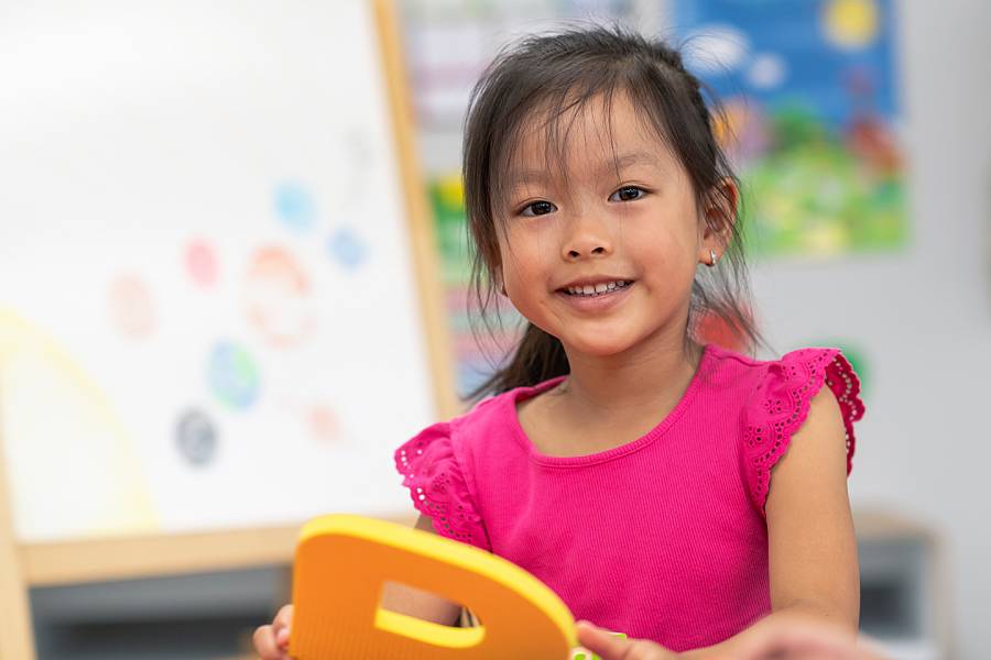 Preschool girl in child care setting