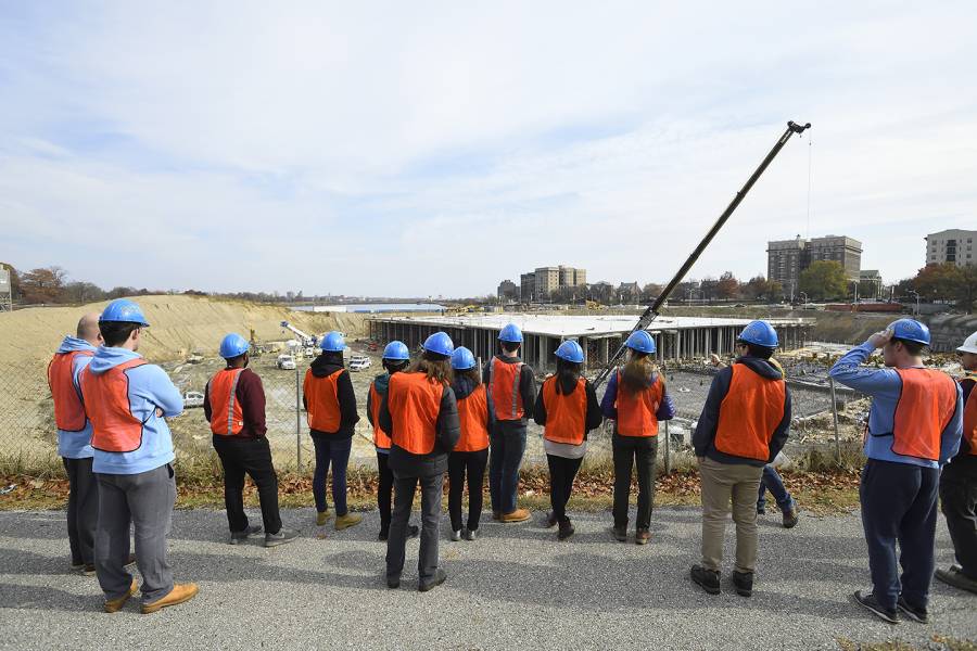 Civil engineering students on a trip to the reservoir at Druid Hill