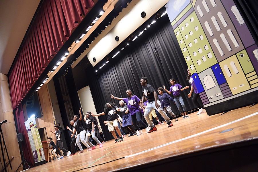 Students dance onstage
