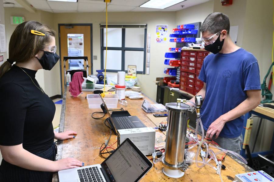 Students work on an engineering project in the design lab space
