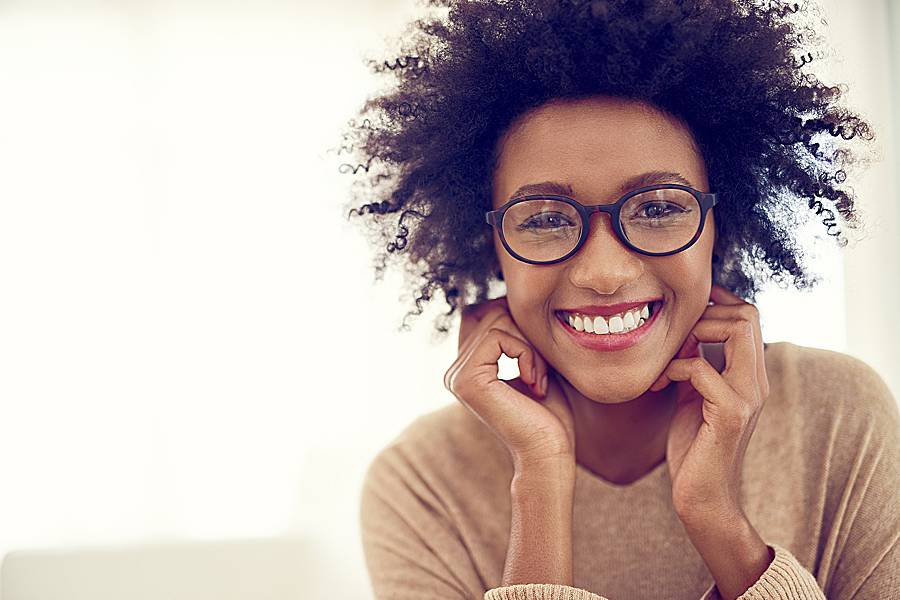 Smiling woman wearing eyeglasse