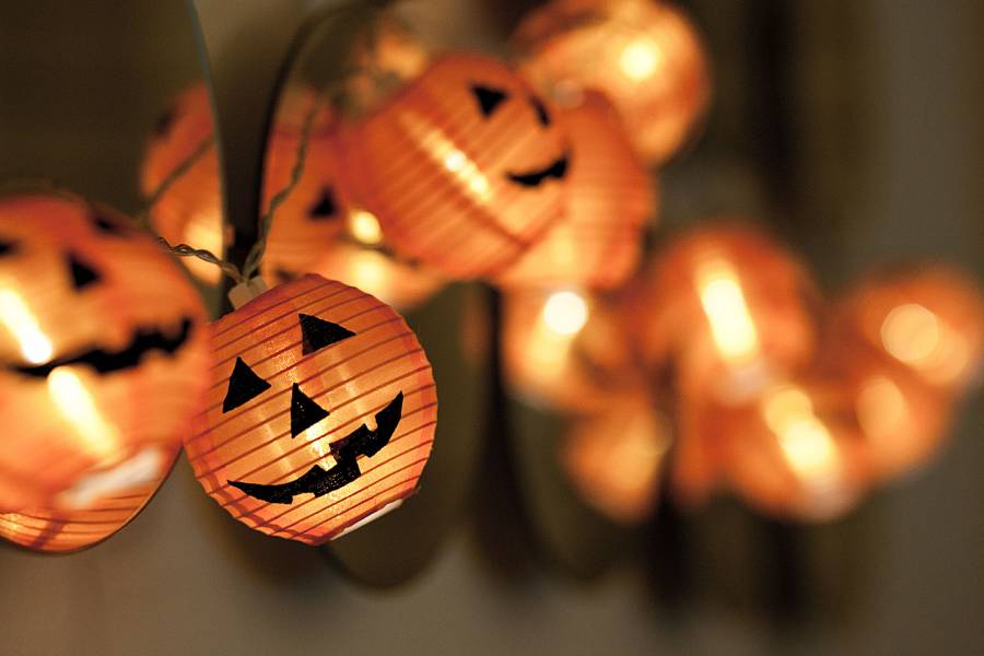 Close-up of a string of pumpkin lights