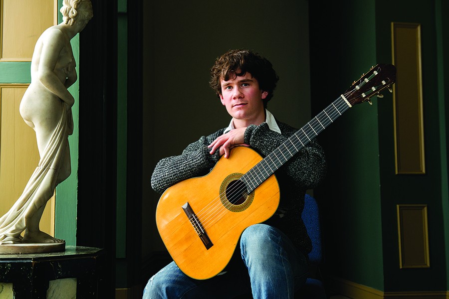 Peabody student Oscar Somersalo with the Fleta guitar