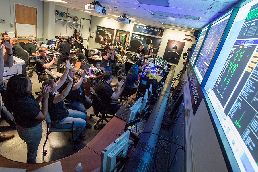 New Horizons flight controllers celebrate