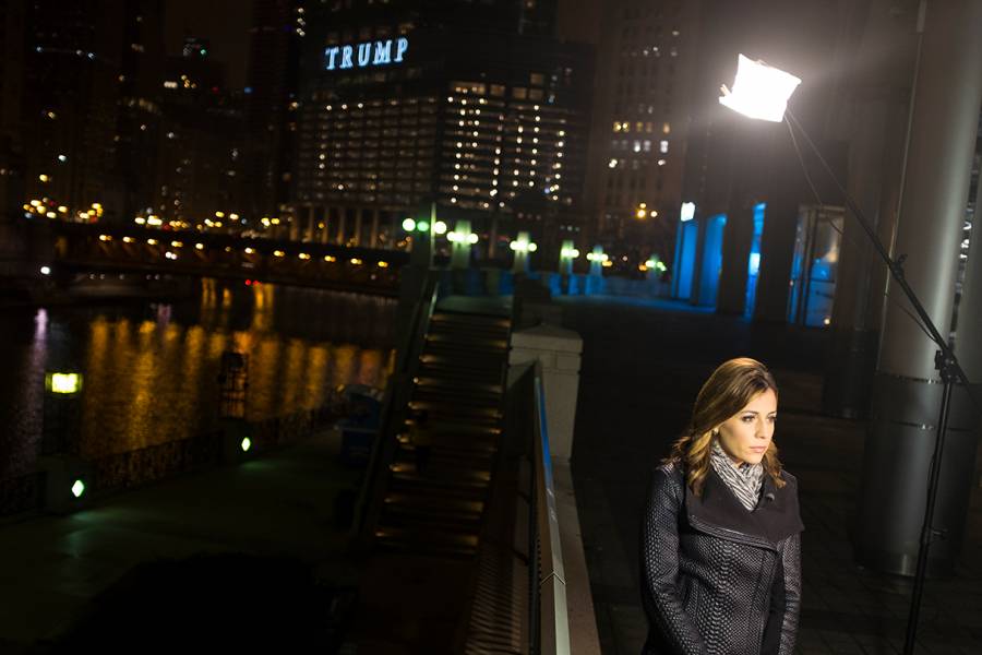 Reporter Hallie Jackson stands in front of a camera with Trump Tower in the background