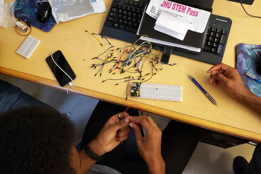Patterson High students work with electrical wires as part of STEM project