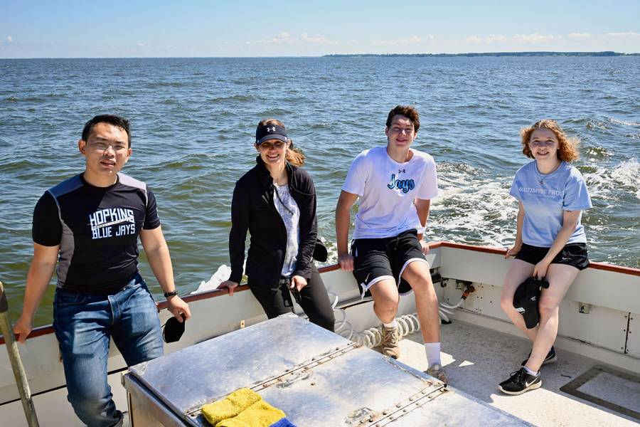 Sarah Preheim with students on the Chesapeake Bay