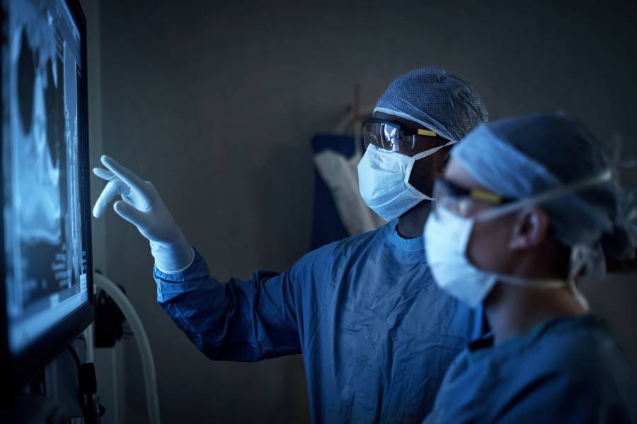 Radiologists examine an x-ray