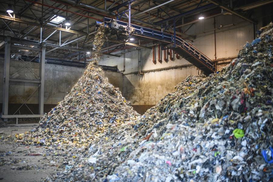 Stacks of waste in a recycling plant