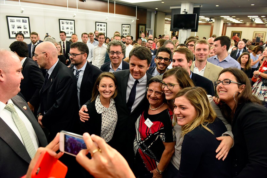 Matteo Renzi poses for photos with SAIS students and others