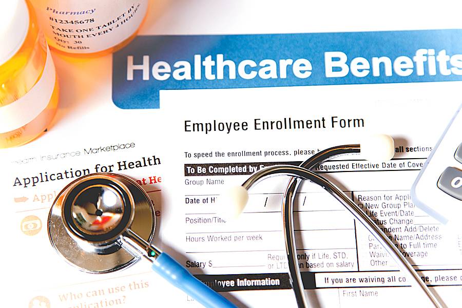 Health care forms and a stethoscope