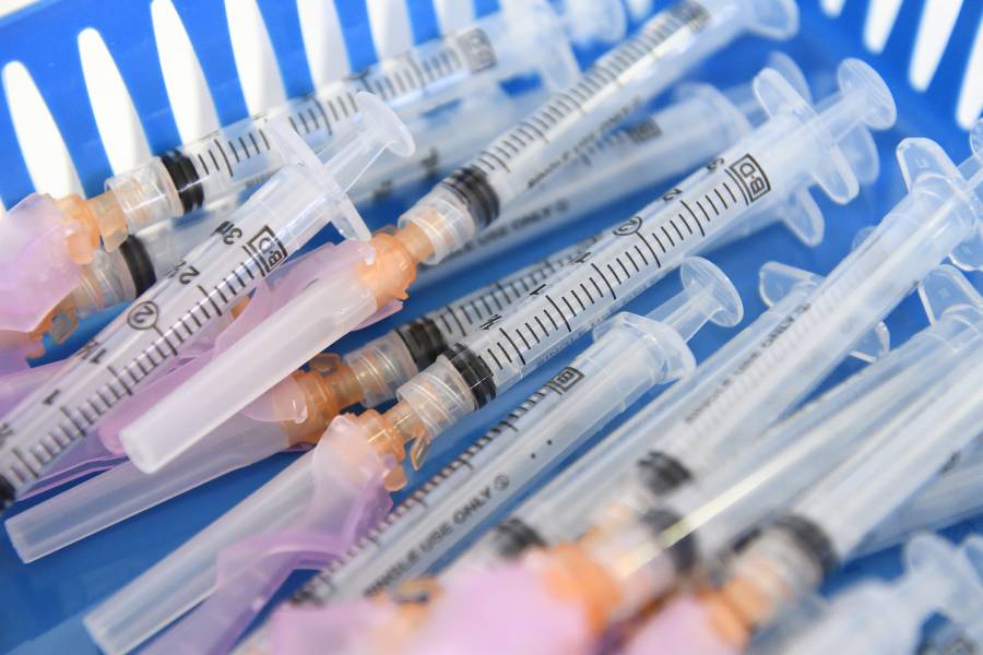 Vaccine needles in a basket