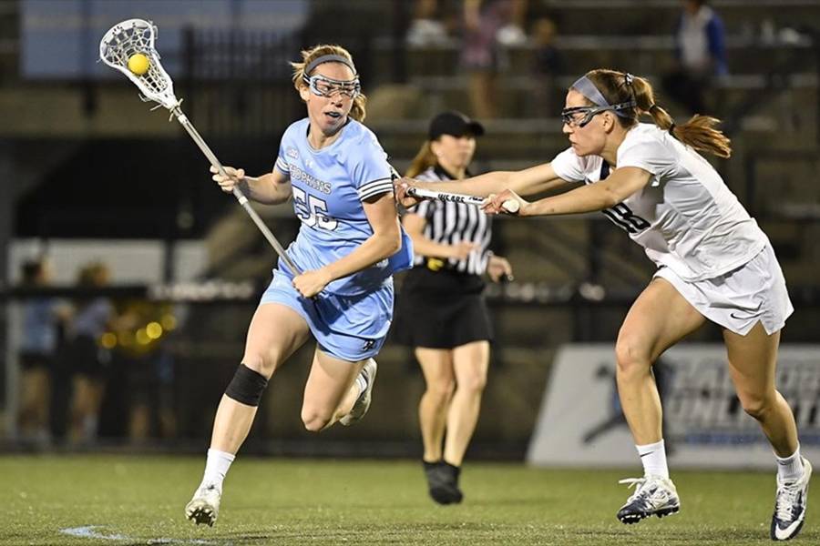 Johns Hopkins senior Ellie McNulty controls the ball vs. a Penn State defender