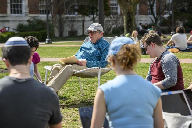 Steven David holds class outside in March 2024