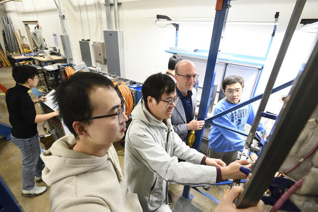 Thomas Gernay, second from right, and team