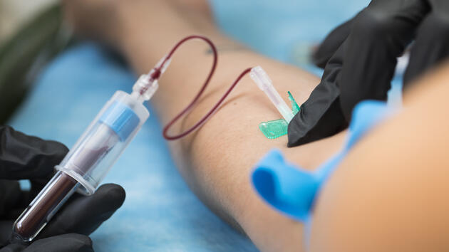 Nurse taking blood samples in hospital