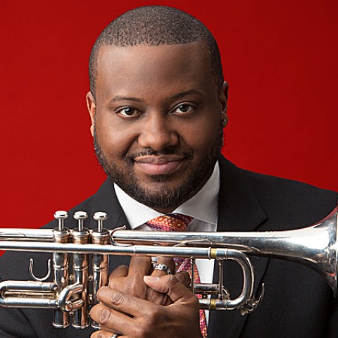 Photo of Sean Jones holding a trumpet