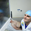 Robert Stevens observes an electrocardiogram monitor
